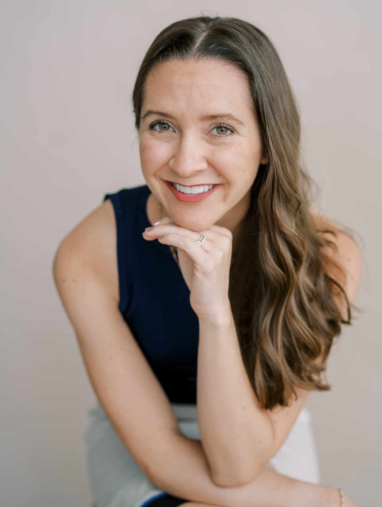 Julia Brown, founder of Teloscope, resting her chin on her hand